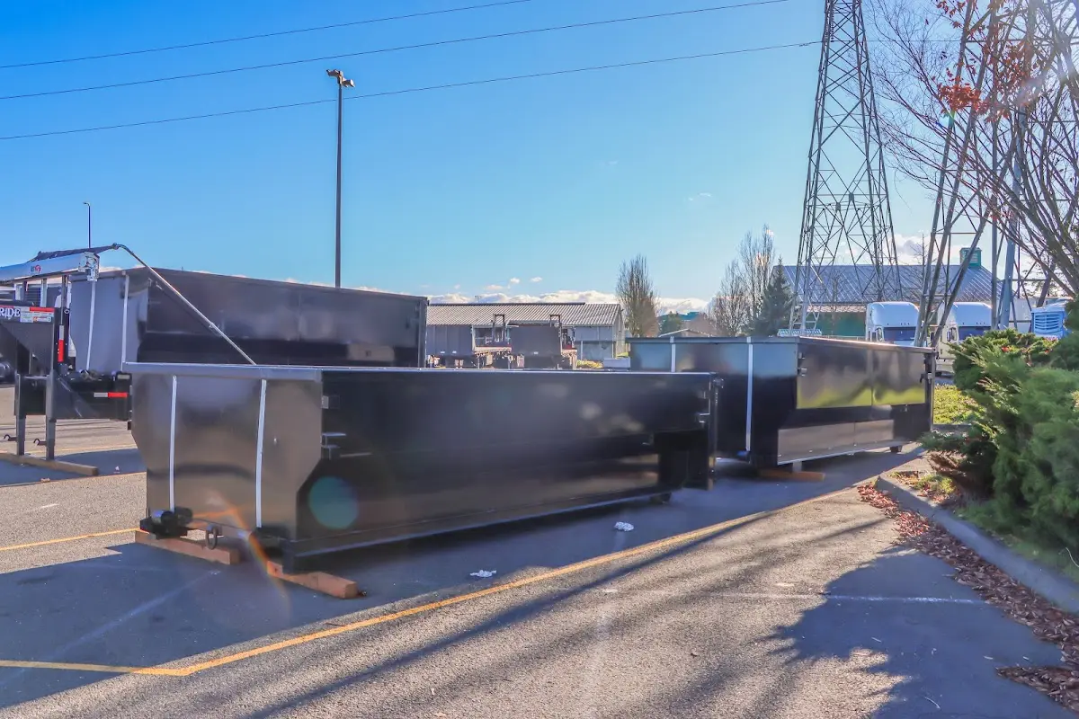 Roll-off dumpster ready for waste disposal at job site for Commercial Dumpster Rental in Carneys Point